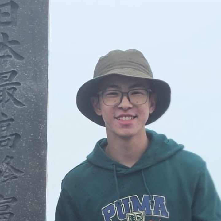 Ryan Wee at the summit of Mount Fuji